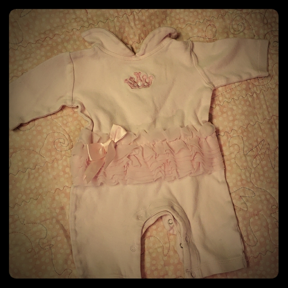 Pink baby bodysuit with waist ruffle